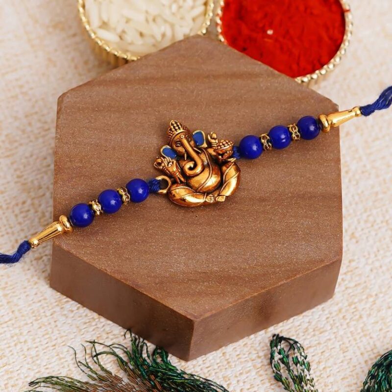 Designer Blue & Gold Ganesha Rakhi and Roli-Chawal Set